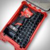 Milwaukee M12 3/8 stubby impact wrench with deep socket set organized in PACKOUT case