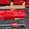 Milwaukee M12 Fuel Ratchet cordless tool with compact head and ergonomic grip displayed with original box